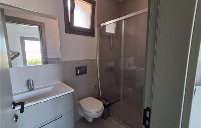 Dörttepe'de havuzlu sitede  aydan aya ödemeli 2+1 bahce katı daire