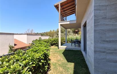 Dörttepe'de havuzlu sitede  aydan aya ödemeli 2+1 bahce katı daire