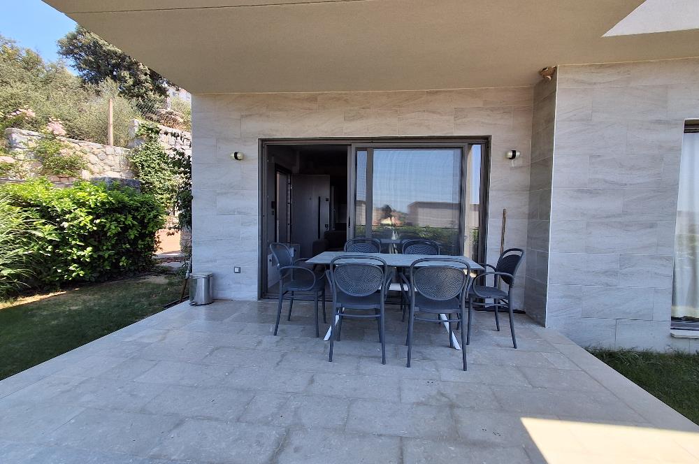 Dörttepe'de havuzlu sitede  aydan aya ödemeli 2+1 bahce katı daire