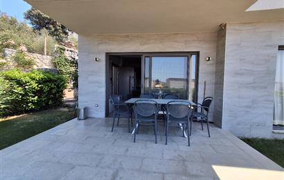 Dörttepe'de havuzlu sitede  aydan aya ödemeli 2+1 bahce katı daire