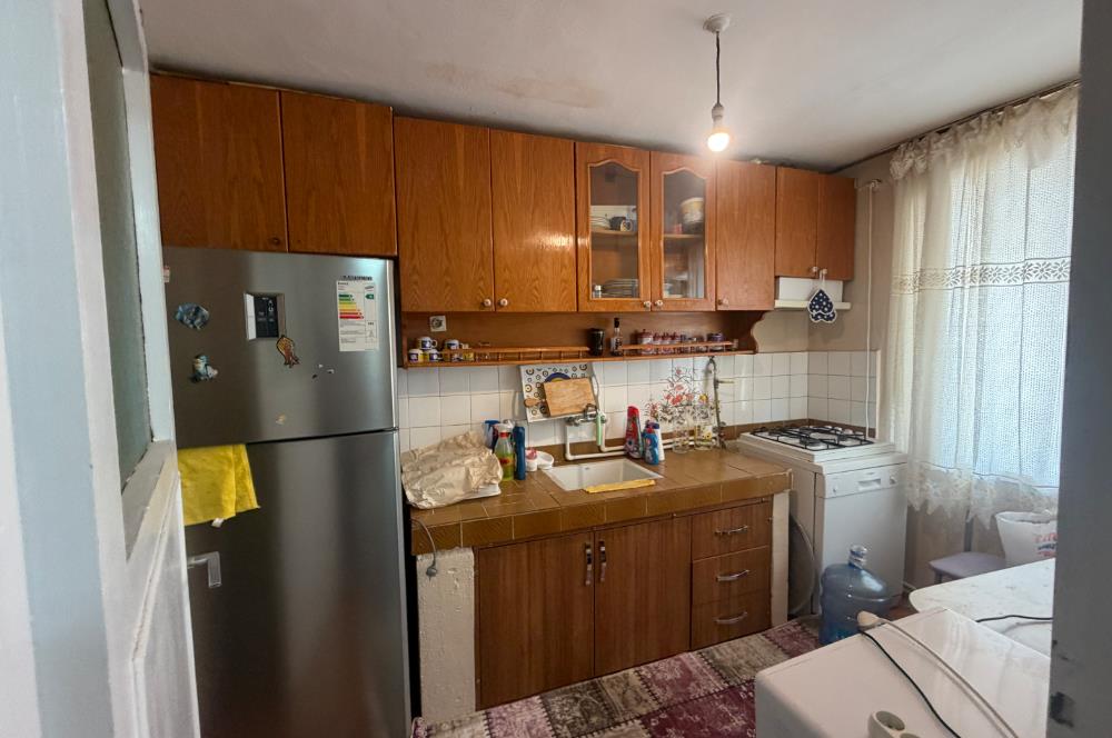 ADAPAZARI'NDA SATILIK MÜLK: 184 m2 ARSA, 2 DÜKKAN, 2 DAİRE