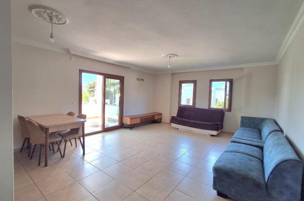 Bodrum Ortakent  kiralık eşyasız 2+1 giriş katı daire
