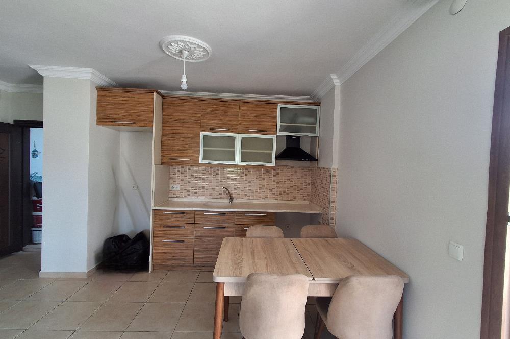 Bodrum Ortakent  kiralık eşyasız 2+1 giriş katı daire