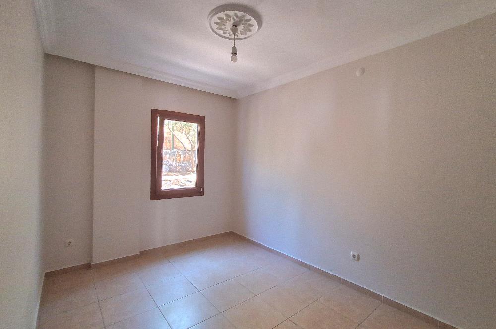 Bodrum Ortakent  kiralık eşyasız 2+1 giriş katı daire