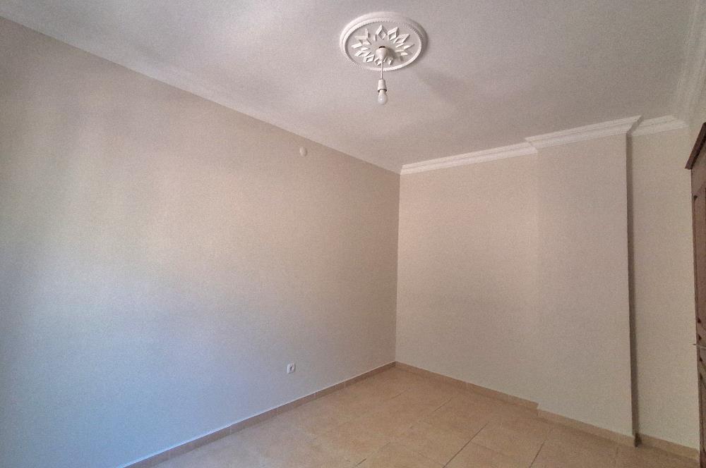 Bodrum Ortakent  kiralık eşyasız 2+1 giriş katı daire