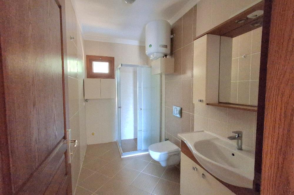 Bodrum Ortakent  kiralık eşyasız 2+1 giriş katı daire