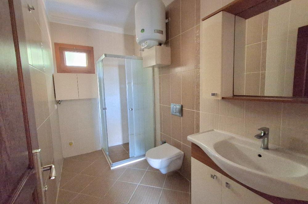 Bodrum Ortakent  kiralık eşyasız 2+1 giriş katı daire