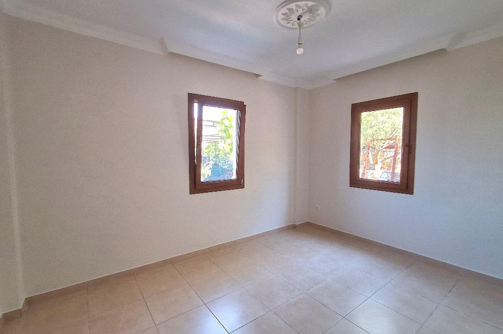 Bodrum Ortakent  kiralık eşyasız 2+1 giriş katı daire