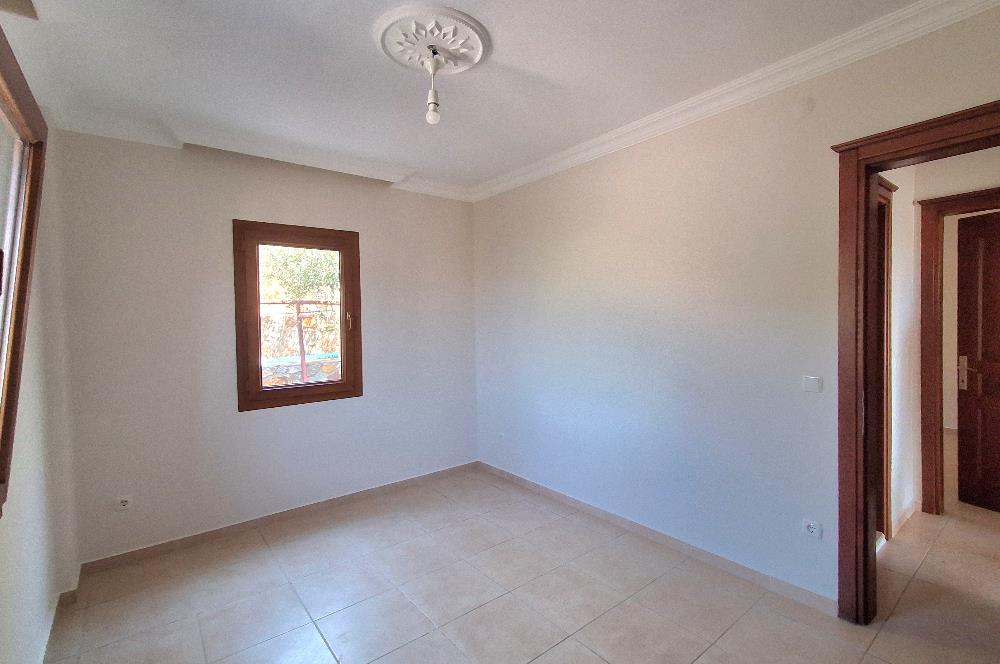 Bodrum Ortakent  kiralık eşyasız 2+1 giriş katı daire