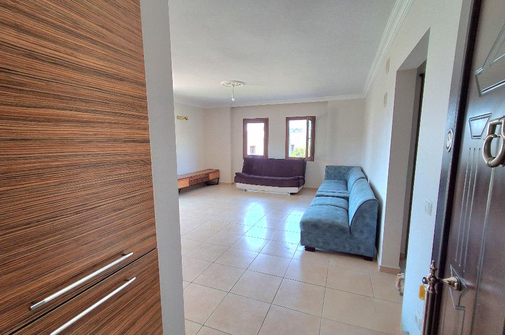 Bodrum Ortakent  kiralık eşyasız 2+1 giriş katı daire