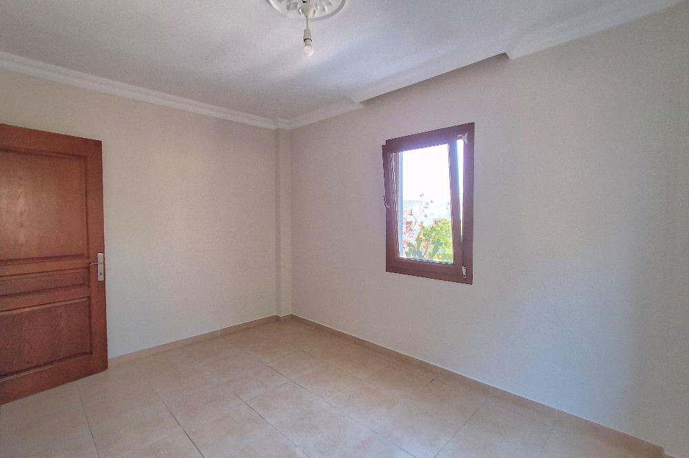 Bodrum Ortakent  kiralık eşyasız 2+1 giriş katı daire