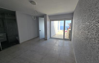 Bodrum Gümüşlükte Deniz Manzaralı Satılık 3+1 Bahçe Dubleks