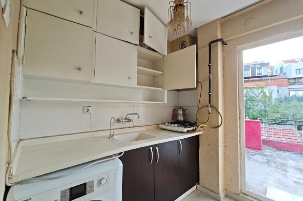 DİNKÇİLER MAHALLESİNDE   SATILIK  2+1  ÇATI KATI DAİRE CENTURY 21 BAL'DAN  