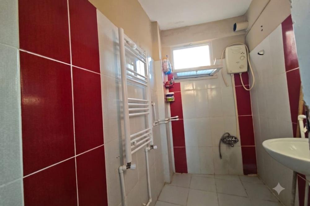 DİNKÇİLER MAHALLESİNDE   SATILIK  2+1  ÇATI KATI DAİRE CENTURY 21 BAL'DAN  