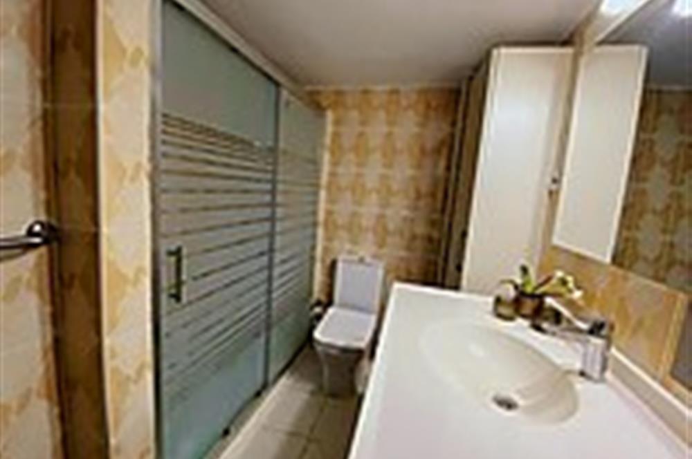 BOSTANLI'DA NEZİH SOKAKTA SATILIK BAKIMLI DAİRE