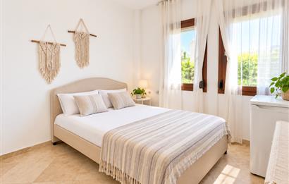 Bodrum Gündoğan'da Deniz Manzaralı Özel İskeleli 3+1 Bahçe Katı Daire