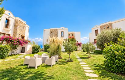Bodrum Gündoğan'da Deniz Manzaralı Özel İskeleli 3+1 Bahçe Katı Daire