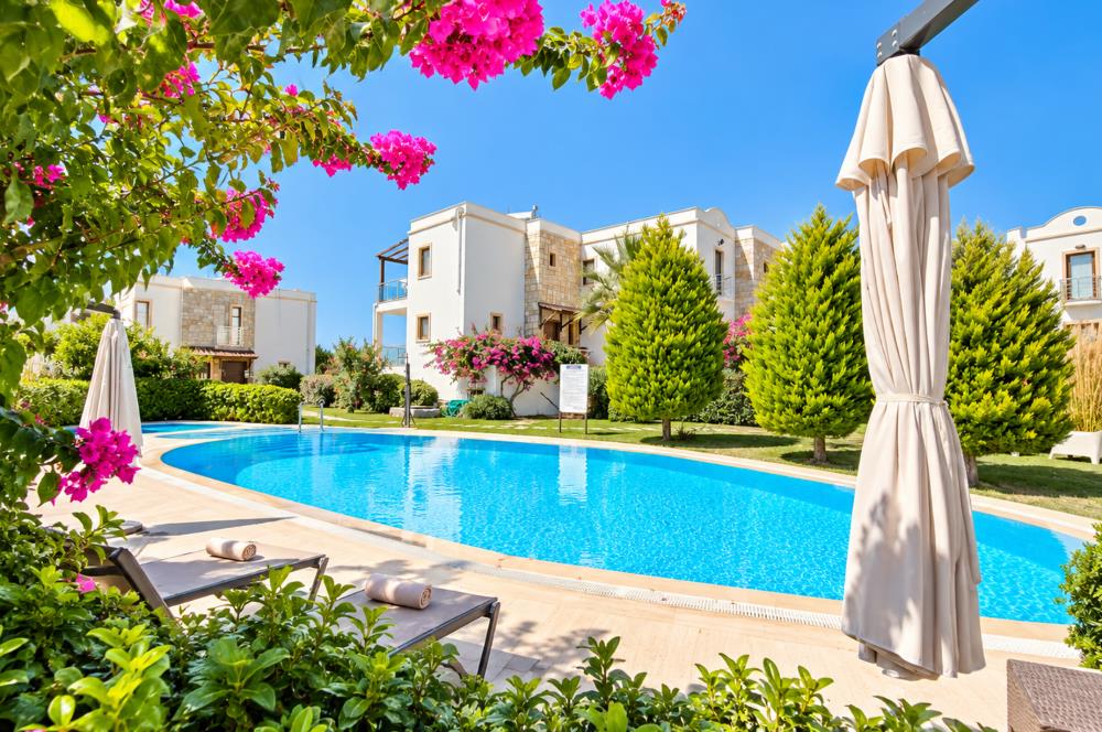 Bodrum Gündoğan'da Deniz Manzaralı Özel İskeleli 3+1 Bahçe Katı Daire