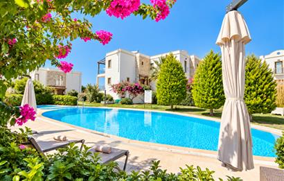 Bodrum Gündoğan'da Deniz Manzaralı Özel İskeleli 3+1 Bahçe Katı Daire