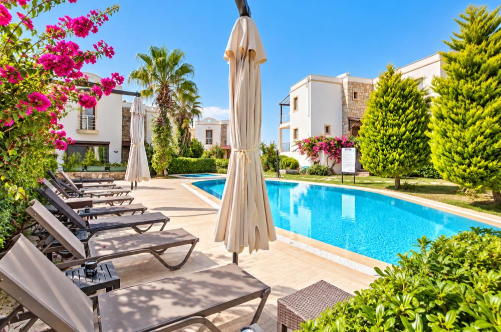 Bodrum Gündoğan'da Deniz Manzaralı Özel İskeleli 3+1 Bahçe Katı Daire