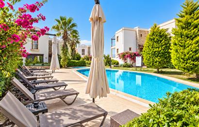 Bodrum Gündoğan'da Deniz Manzaralı Özel İskeleli 3+1 Bahçe Katı Daire