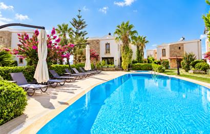 Bodrum Gündoğan'da Deniz Manzaralı Özel İskeleli 3+1 Bahçe Katı Daire