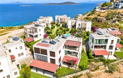 Bodrum Gündoğan'da Deniz Manzaralı Özel İskeleli 3+1 Bahçe Katı Daire