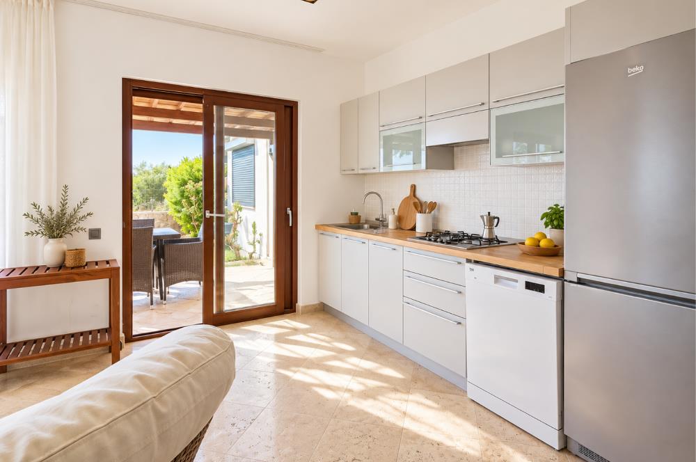 Bodrum Gündoğan'da Deniz Manzaralı Özel İskeleli 3+1 Bahçe Katı Daire