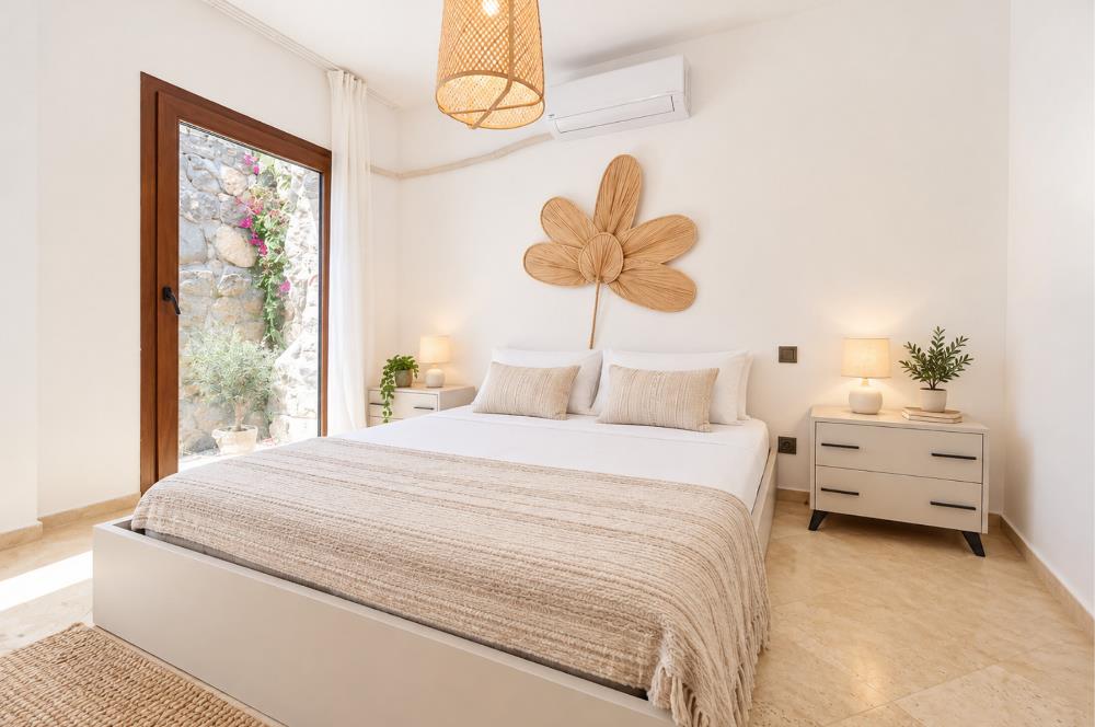 Bodrum Gündoğan'da Deniz Manzaralı Özel İskeleli 3+1 Bahçe Katı Daire