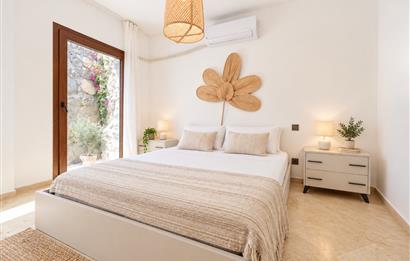 Bodrum Gündoğan'da Deniz Manzaralı Özel İskeleli 3+1 Bahçe Katı Daire
