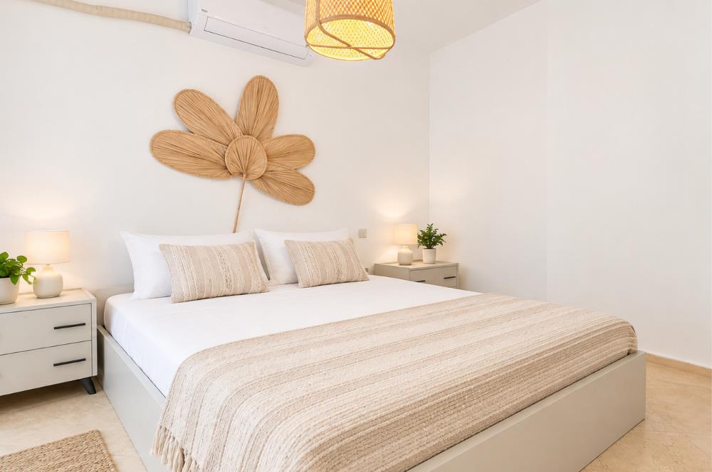 Bodrum Gündoğan'da Deniz Manzaralı Özel İskeleli 3+1 Bahçe Katı Daire
