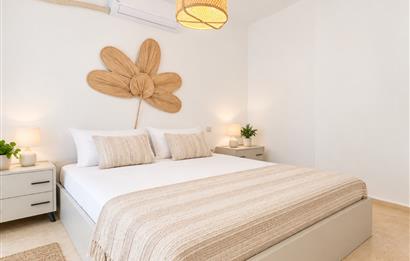 Bodrum Gündoğan'da Deniz Manzaralı Özel İskeleli 3+1 Bahçe Katı Daire