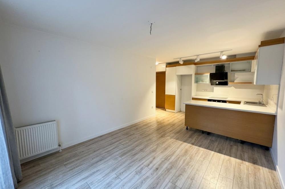 City Ambiance'ta Bahçe Kullanımlı Satılık 1+1 Daire