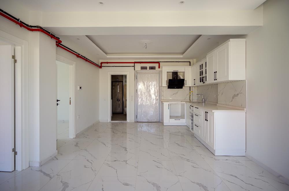 ANA CADDE ÜZERİ SIFIR 2+1 KİRALIK OFİSLER
