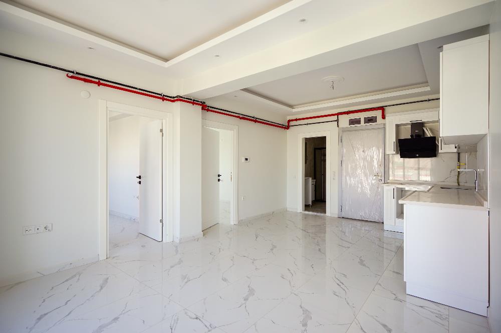ANA CADDE ÜZERİ SIFIR 2+1 KİRALIK OFİSLER