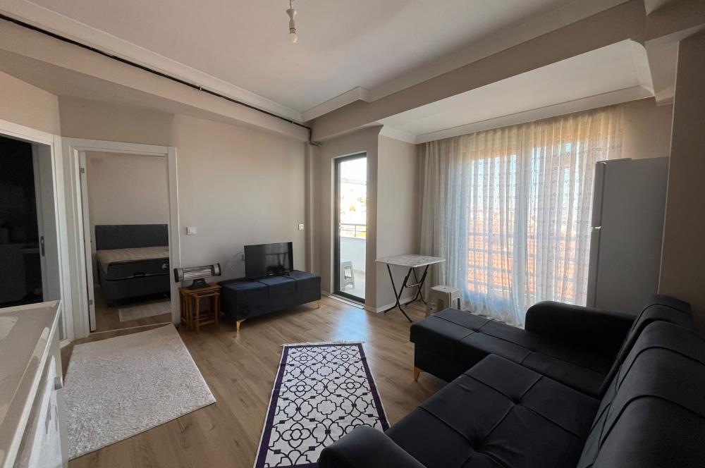C21 BAL'DAN SÜTLÜCE MAHALLESİNDE 1+1 EŞYALI KİRALIK DAİRE