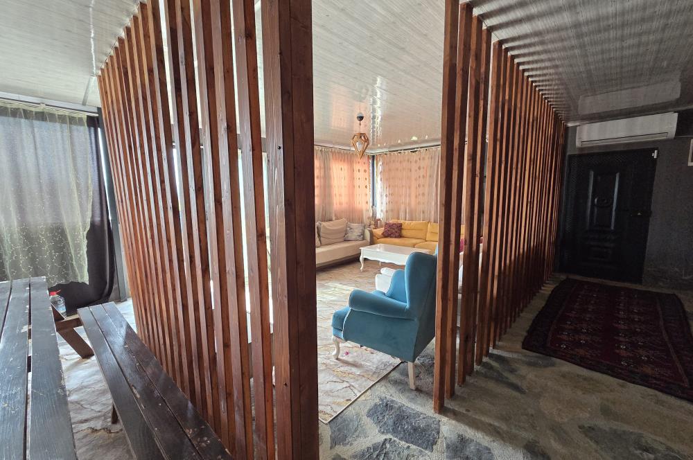 Mumcular Gökyer yıllık  kiralık 1698 m2 tarla ve icerisinde 1+1 esyalı müstakil ev
