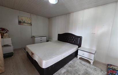 Mumcular Gökyer yıllık  kiralık 1698 m2 tarla ve icerisinde 1+1 esyalı müstakil ev