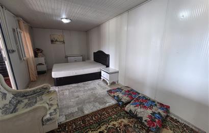 Mumcular Gökyer yıllık  kiralık 1698 m2 tarla ve icerisinde 1+1 esyalı müstakil ev