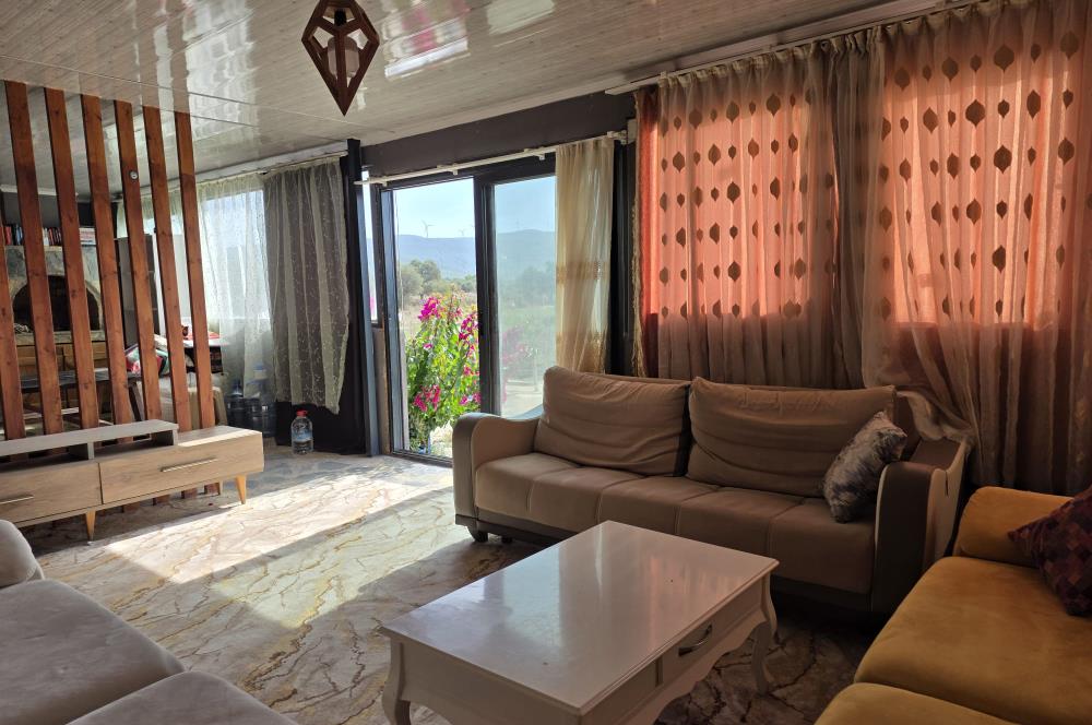 Mumcular Gökyer yıllık  kiralık 1698 m2 tarla ve icerisinde 1+1 esyalı müstakil ev
