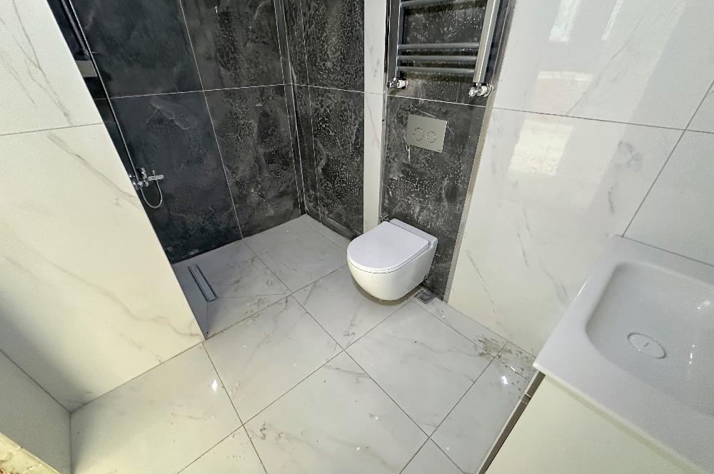 C21 UZMAN'dan YOMRA SİTE İÇİNDE DENİZ MANZARALI 1+1