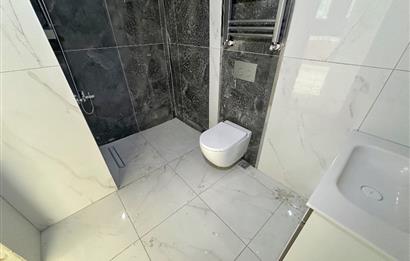 C21 UZMAN'dan YOMRA SİTE İÇİNDE DENİZ MANZARALI 1+1