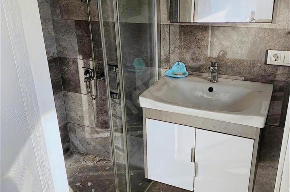 Kıyıkışlacık'da Gülüm Kıyı Sitesinde Denize Nazır Satılık Villa