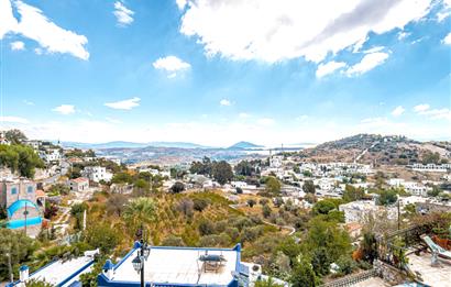 BODRUM GÜRECE’DE DENİZ MANZARALI, SONSUZLUK HAVUZLU ÖZEL TAŞ EV