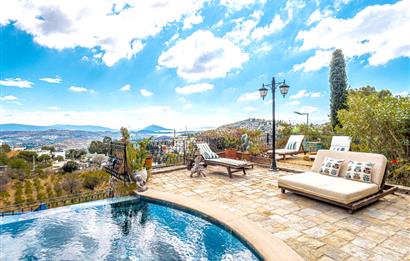 BODRUM GÜRECE’DE DENİZ MANZARALI, SONSUZLUK HAVUZLU ÖZEL TAŞ EV