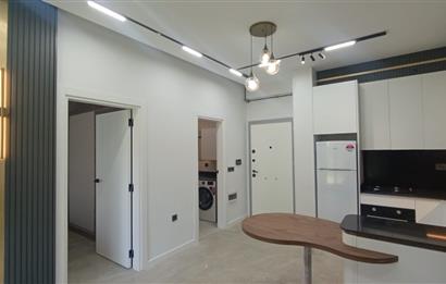 C21 LOFT'TAN SERVERGAZİ'DE HAVUZLU SİTEDE EŞYALI SATILIK 1+1