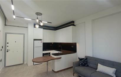 C21 LOFT'TAN SERVERGAZİ'DE HAVUZLU SİTEDE EŞYALI SATILIK 1+1