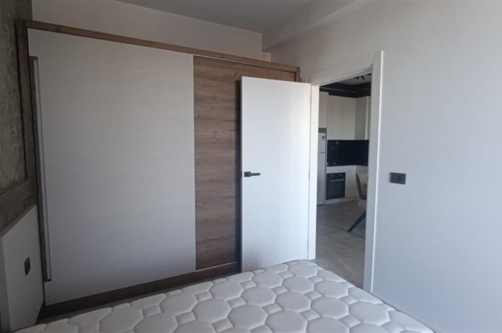 C21 LOFT'TAN SERVERGAZİ'DE HAVUZLU SİTEDE EŞYALI SATILIK 1+1