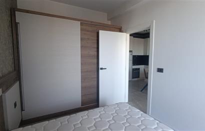 C21 LOFT'TAN SERVERGAZİ'DE HAVUZLU SİTEDE EŞYALI SATILIK 1+1