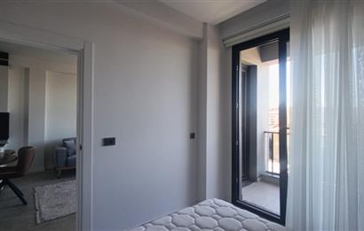 C21 LOFT'TAN SERVERGAZİ'DE HAVUZLU SİTEDE EŞYALI SATILIK 1+1
